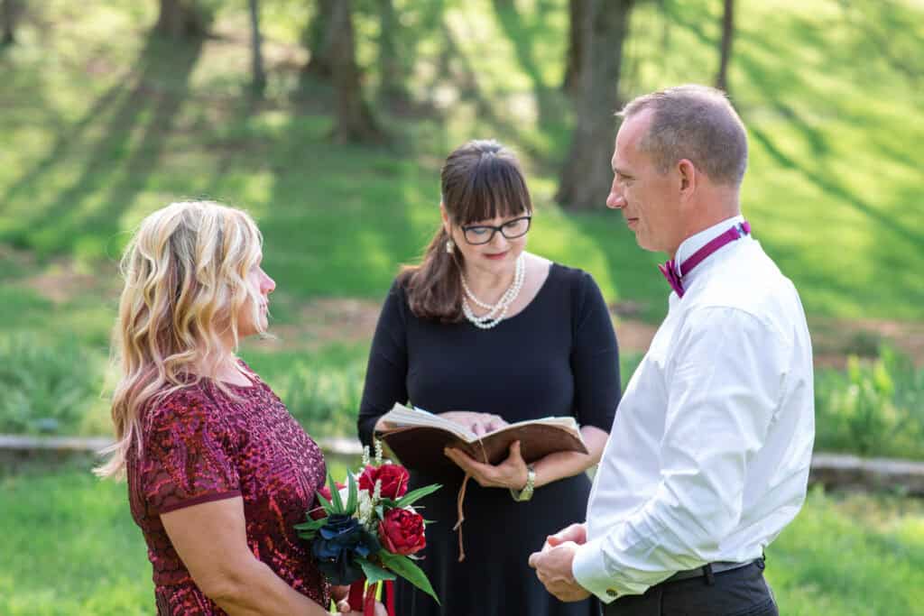 Chaplain performs elopement ceremony in outdoor park