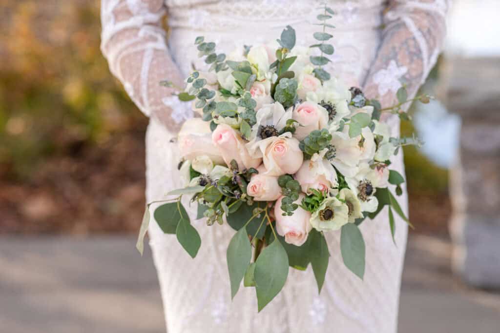 bridal bouquet of white and blush roses