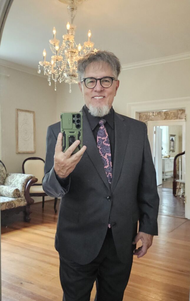 Chaplain Jay Rephan poses for portrait at Riverwood Mansion.